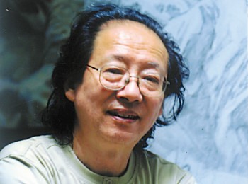 画家 何哲生