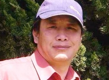 画家 梁义勇
