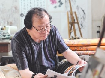 画家 覃仕泉