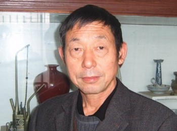 画家 何保全