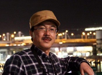 画家 何文青